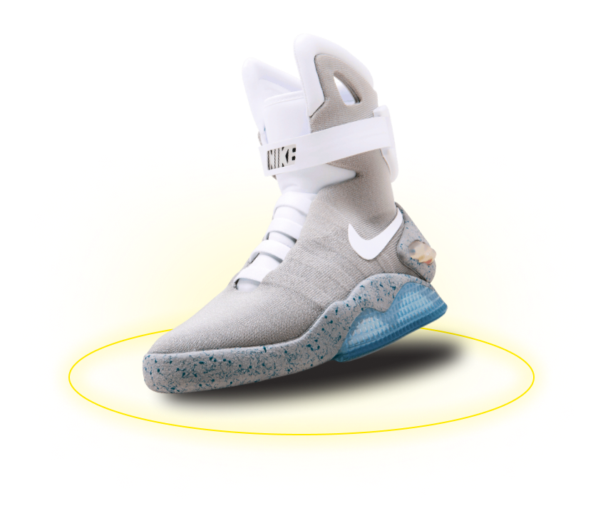 Кроссовок модели Nike Air Mag cо светящейся желтой обводкой под подошвой